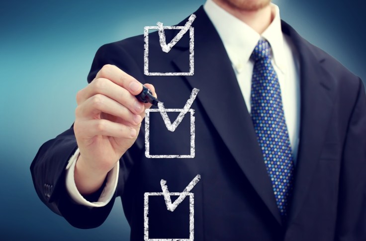 Business Man With Checkboxes